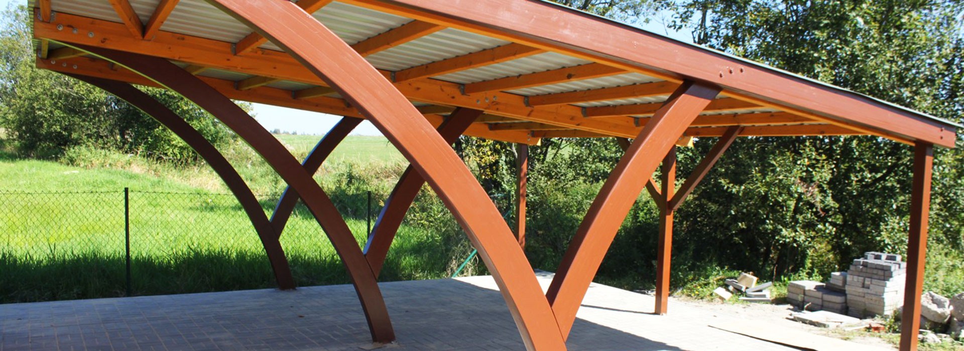 Wooden sheds and garage parking space on the car