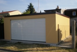 Assembled garage with plaster and flat roof