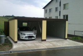 Assembled double garage with plaster and flat roof