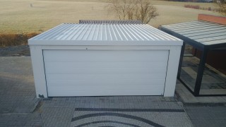 Assembled double garage with plaster and flat roof