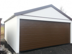 Assembled double garage with plaster and saddle roof