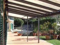 TERRADO aluminum pergola with rolling shield