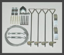 Anchoring system for greenhouses