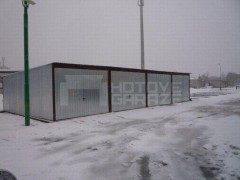 Sheet metal double garage with plinth roof in galvanized