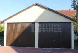 Assembled double garage with plaster and saddle roof