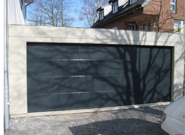 Concrete double garage with floor 598x598 cm large gates