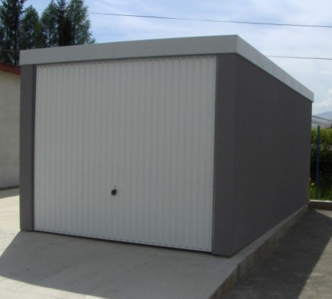 Assembled garage with plaster and flat roof